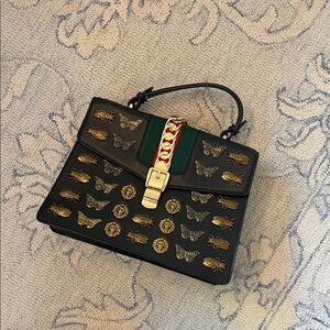 Black Embellished Top-Handle Faux Leather with Green Red Accent